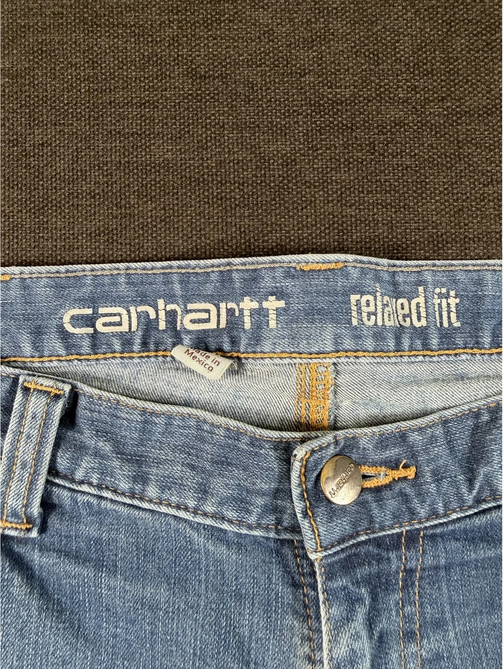 Carhartt Men's Light Blue Denim Work Jeans with Distressed Details, Size 34x34